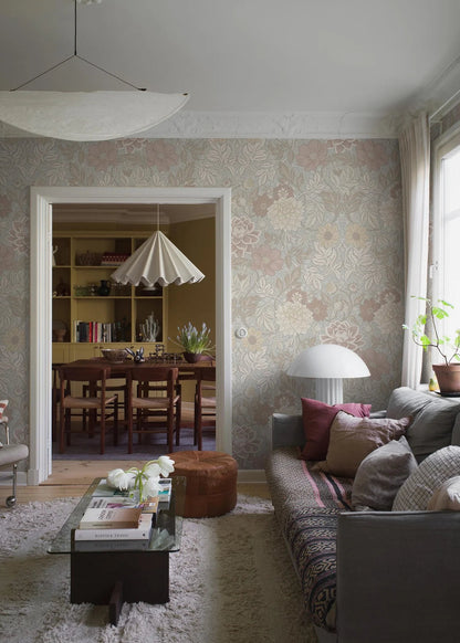 The large-scale Dahlia Garden Grand wallpaper is an enlarged reprint of our modern classic, Dahlia Garden. The hand-painted floral ornament feels warm and harmonious