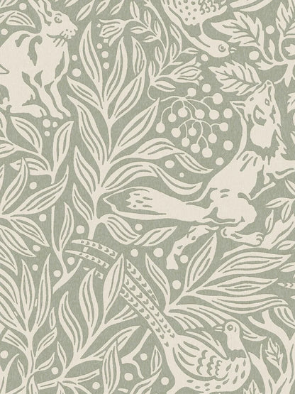  Under the Elder Tree Grand is a boldly patterned wallpaper, covered in lush foliage filled with playful animals. 