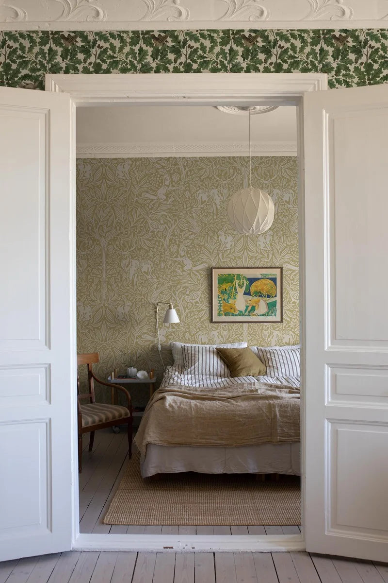 The pattern is inspired by medieval tapestries and also carries Arts &amp; Crafts influences. In this enlarged scale, it becomes a powerful wall painting!