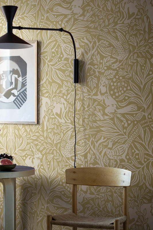 The pattern is inspired by medieval tapestries and also carries Arts &amp; Crafts influences. In this enlarged scale, it becomes a powerful wall painting!