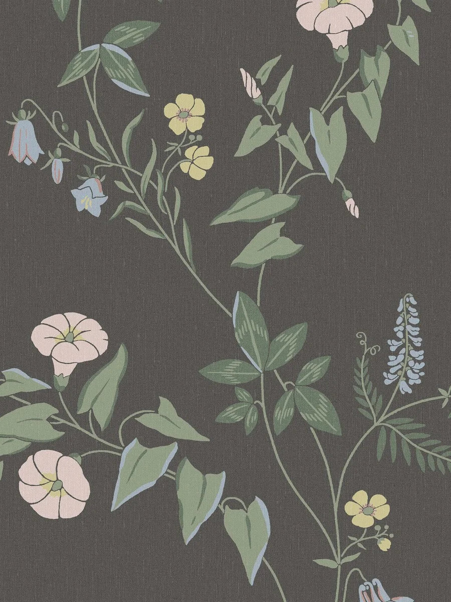 The dark, floral Midsummer Eve Grand wallpaper is an enlarged digital reprint of our hand-painted design of the same name.