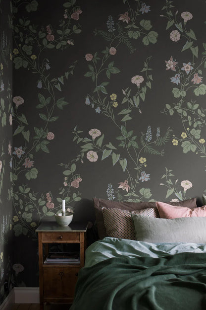 The dark, floral Midsummer Eve Grand wallpaper is an enlarged digital reprint of our hand-painted design of the same name.