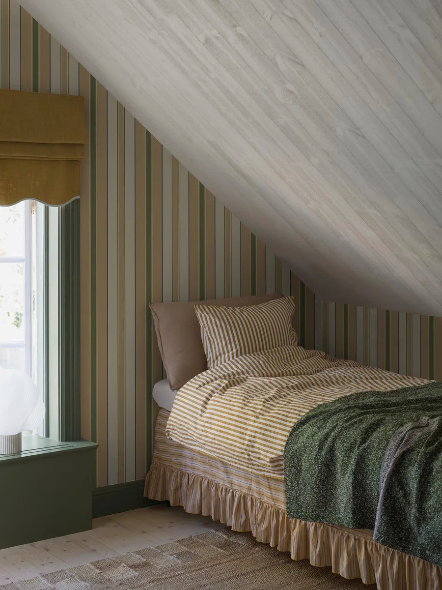 Stockholm Stripe is a timeless striped wallpaper, digitally printed on an extra-large scale. 