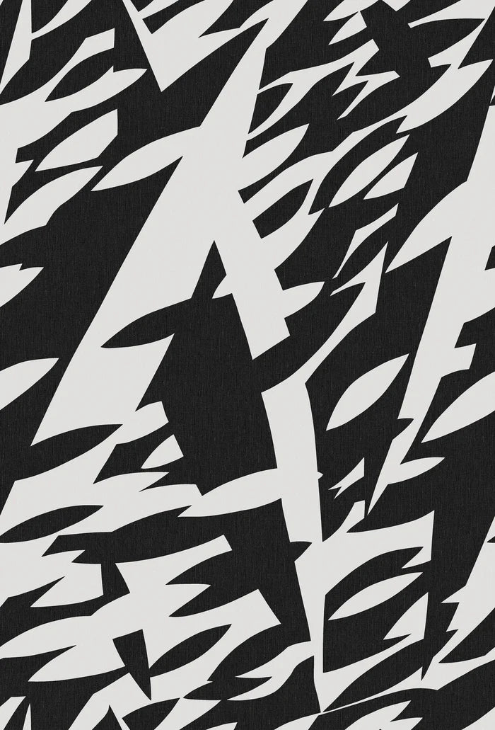 The black-and-white mural wallpaper Delfinisk Rörelse is based on one of Karl Axel Pehrson’s graphic paintings: a stylised image of dolphins in a dense shoal of fish—abstract and representational at the same time.