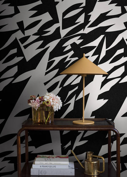 The black-and-white mural wallpaper Delfinisk Rörelse is based on one of Karl Axel Pehrson’s graphic paintings: a stylised image of dolphins in a dense shoal of fish—abstract and representational at the same time.