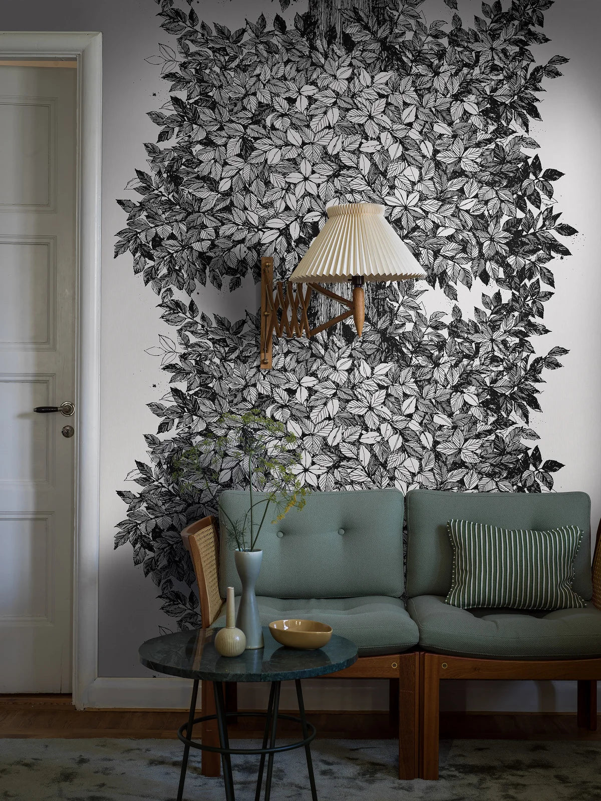 Here, the Hassel mural wallpaper comes in a black-and-white palette, just like Gråsten’s original design. The wallpaper is printed to measure for your wall.
