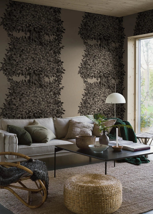 Here, the Hassel mural wallpaper features black details on a grey-brown ground reminiscent of undyed linen. The wallpaper is printed to order, made to measure for your wall.