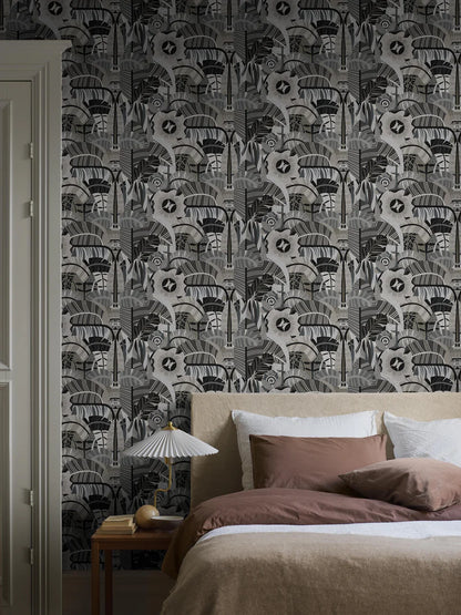 The graphic mural wallpaper Hypnotic Safari features an abstract pattern of soft, organic shapes. Here and there, an eye peeks through the slightly psychedelic design. 