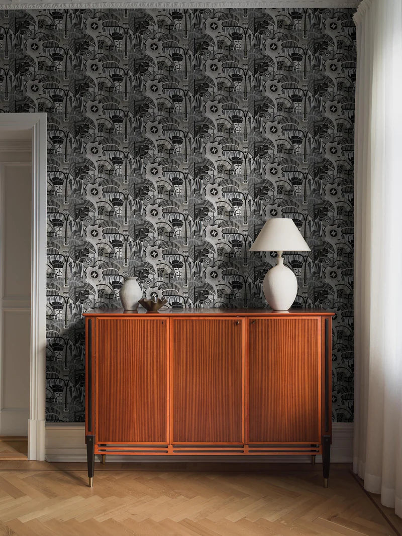 The graphic mural wallpaper Hypnotic Safari features an abstract pattern of soft, organic shapes. Here and there, an eye peeks through the slightly psychedelic design. 