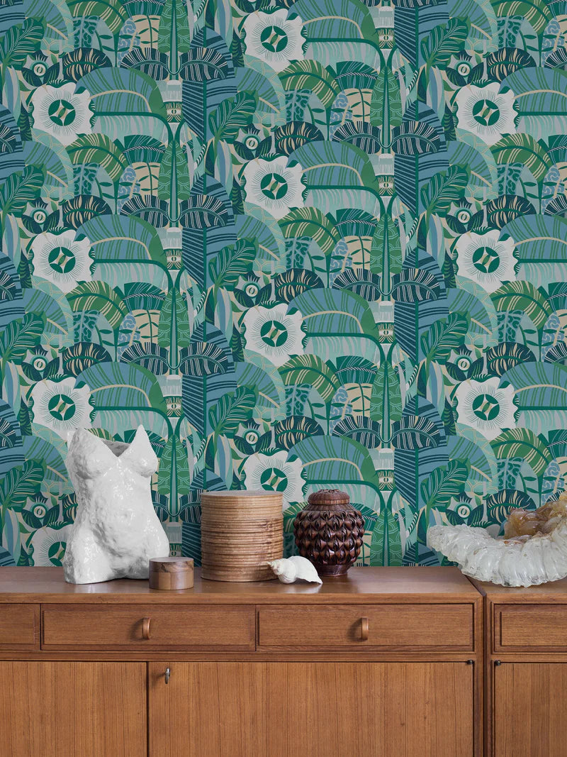 The mural wallpaper Hypnotic Safari features an abstract, psychedelic pattern of rounded, organic shapes, with the occasional eye peeking through. 