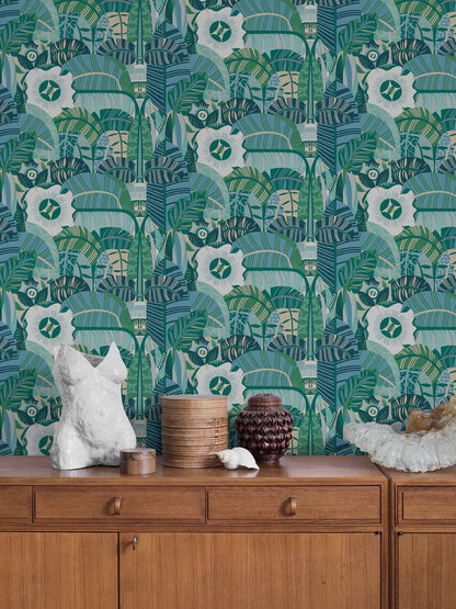 The mural wallpaper Hypnotic Safari features an abstract, psychedelic pattern of rounded, organic shapes, with the occasional eye peeking through. 