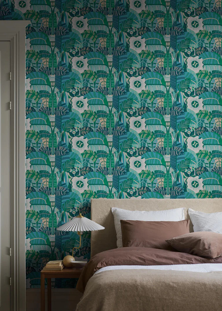 The mural wallpaper Hypnotic Safari features an abstract, psychedelic pattern of rounded, organic shapes, with the occasional eye peeking through. 