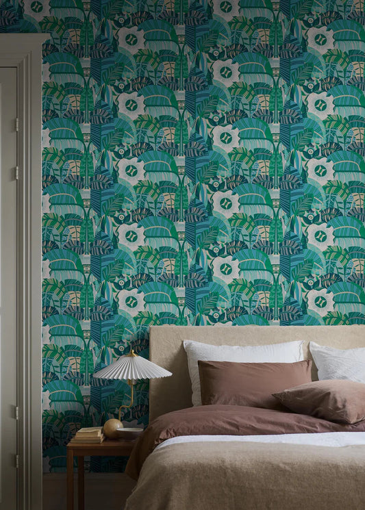 The mural wallpaper Hypnotic Safari features an abstract, psychedelic pattern of rounded, organic shapes, with the occasional eye peeking through. 