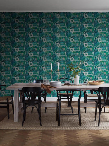 The mural wallpaper Hypnotic Safari features an abstract, psychedelic pattern of rounded, organic shapes, with the occasional eye peeking through. 