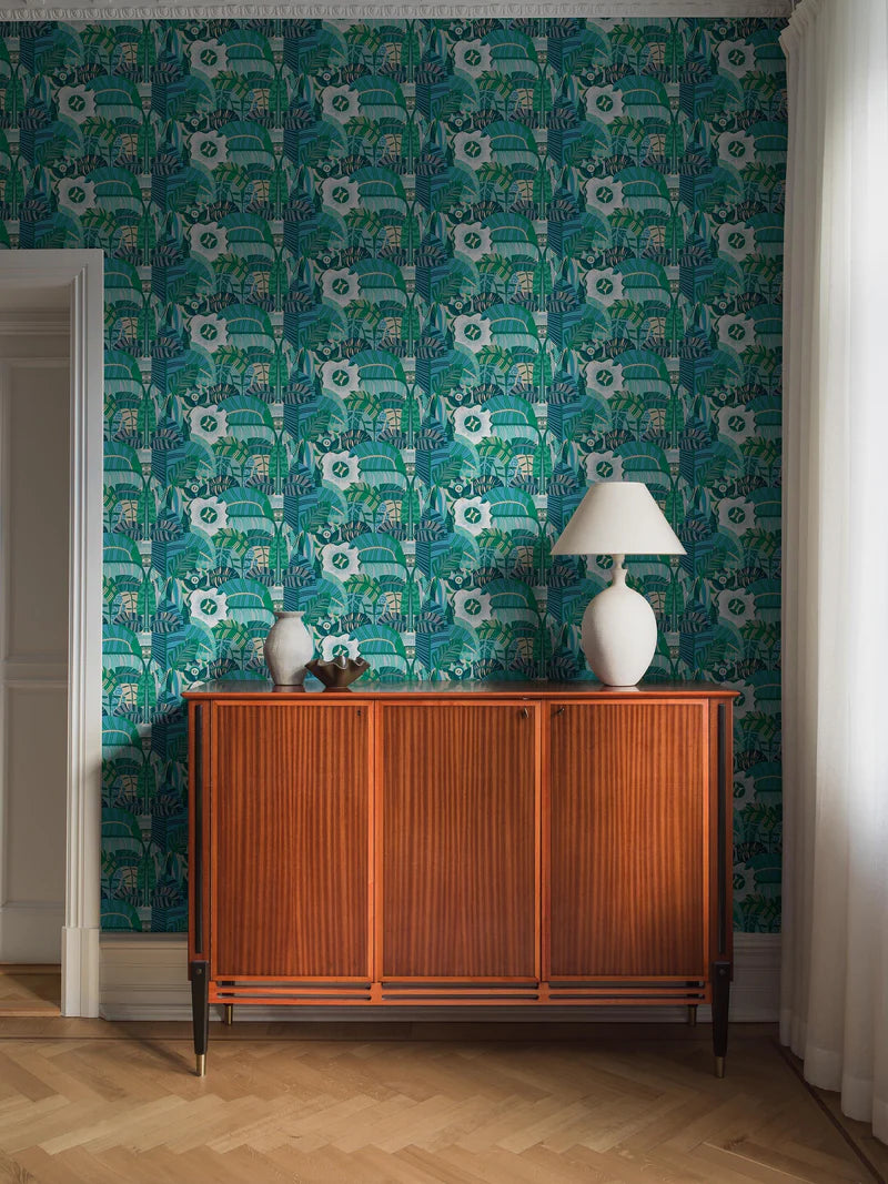 The mural wallpaper Hypnotic Safari features an abstract, psychedelic pattern of rounded, organic shapes, with the occasional eye peeking through. 