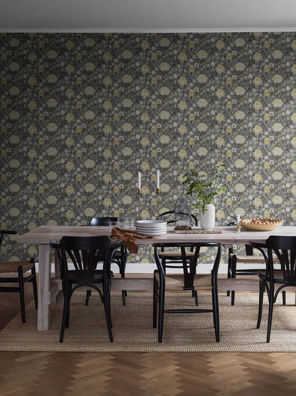The floral mural wallpaper Myrtle features stylised flowers such as sweet peas, roses and tulips—but above all myrtle, the symbol of love and happiness