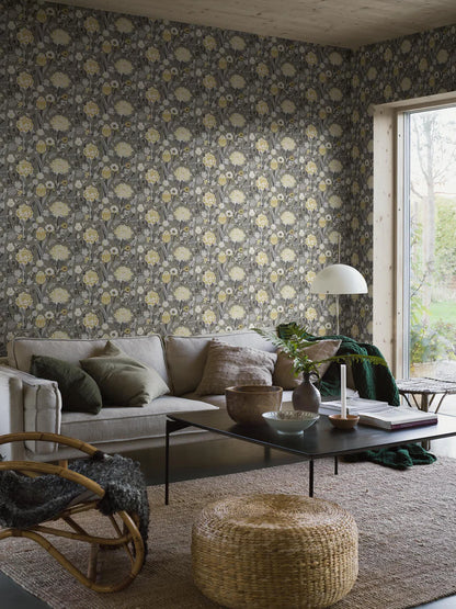 The floral mural wallpaper Myrtle features stylised flowers such as sweet peas, roses and tulips—but above all myrtle, the symbol of love and happiness