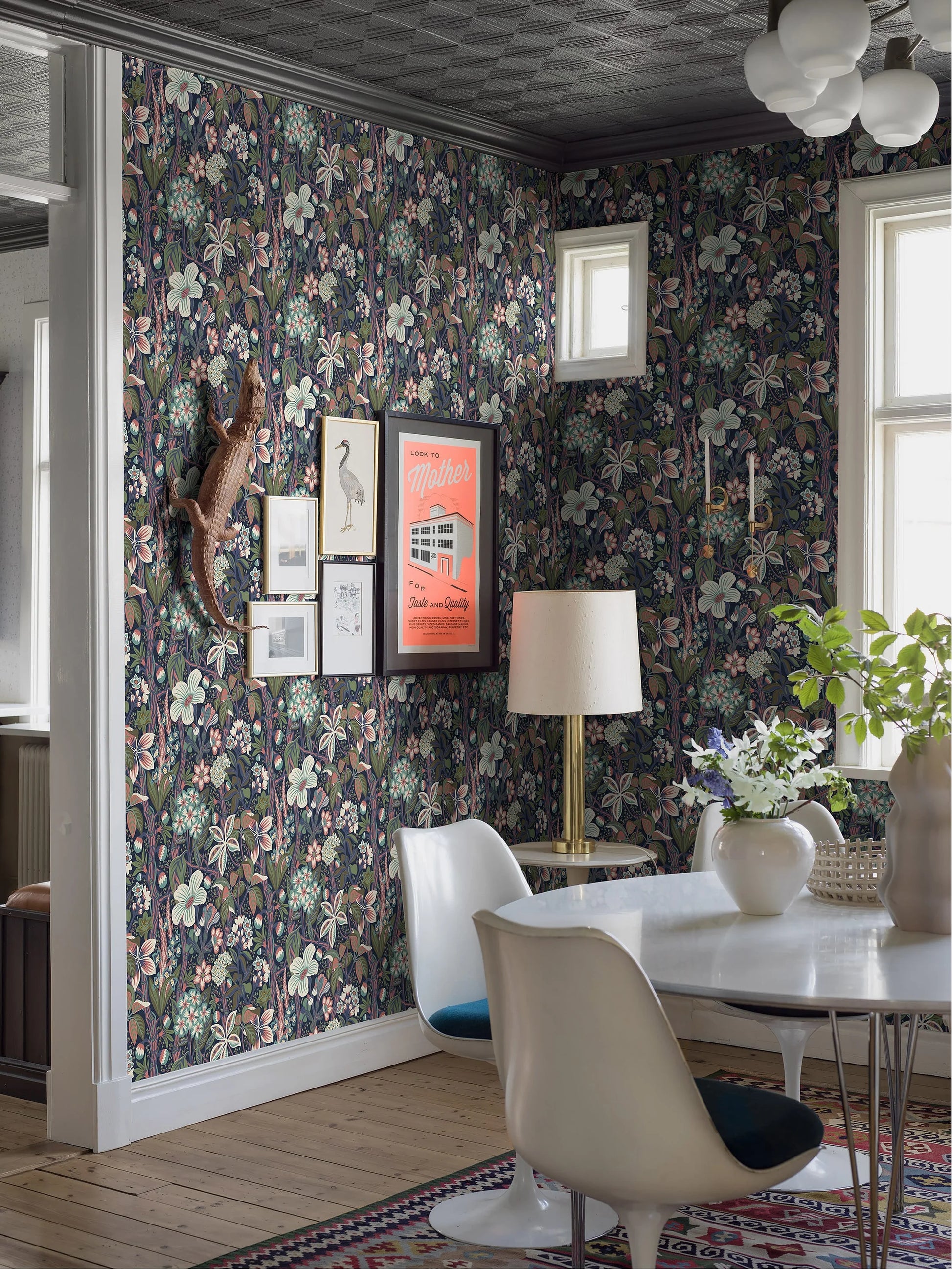 Friviva is a colorful, large-flowered mural wallpaper created by designer Hanna Werning.