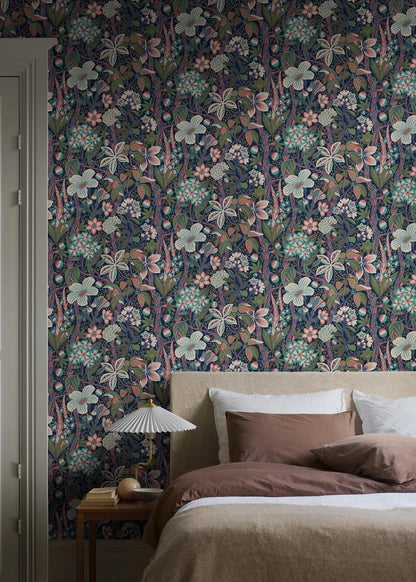 Friviva is a colorful, large-flowered mural wallpaper created by designer Hanna Werning.