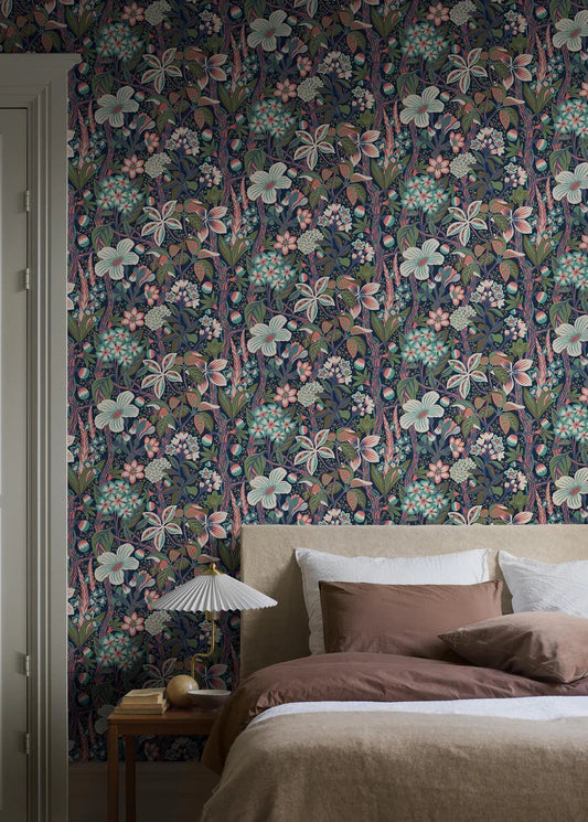 Friviva is a colorful, large-flowered mural wallpaper created by designer Hanna Werning.