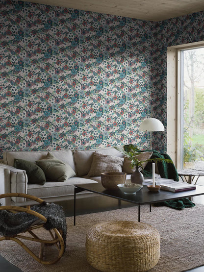 Hanna Werning is known for her lush botanical patterns with a humorous twist, and the floral mural wallpaper Kvackstepp is no exception. 