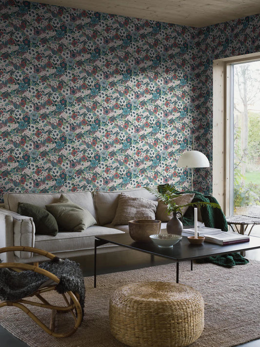 Hanna Werning is known for her lush botanical patterns with a humorous twist, and the floral mural wallpaper Kvackstepp is no exception. 