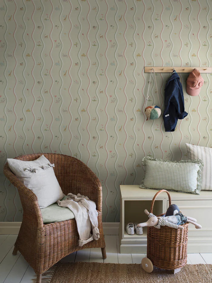 The hand-drawn pattern of Wavy Stripe Animals wallpaper mural appears to be a playful striped design — but look a little closer and a whole world of charm reveals itself.