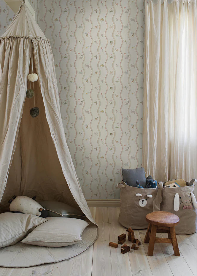 At first glance, the hand-drawn pattern of Wavy Stripe Animals appears to be a playful striped design — but look a little closer and a whole world of charm reveals itself.