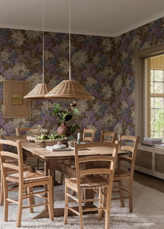 The large-scale, dense pattern of the Delilah Grand wallpaper is an enlarged reprint of a historic tapestry wallpaper from the turn of the last century