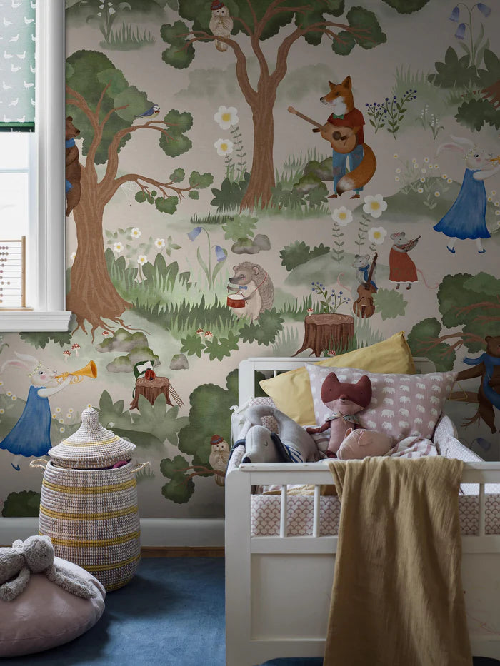 On the charming mural wallpaper Woodland Orchestra, the forest animals have gathered in the clearing between the trees to play music together. Can you see who the conductor is?
