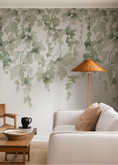 Dawn Forest is a Contemporary and minimalist wallpaper mural featuring delicate, cascading foliage hand-painted in watercolor.