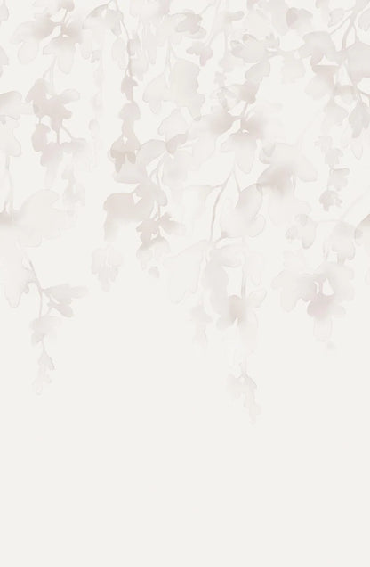 The light wallpaper mural Dawn Forest features hand-painted watercolor foliage that drapes softly down the wall.