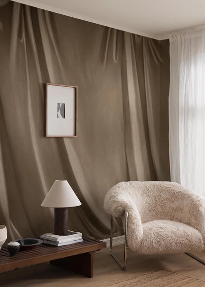 Drape is a hand-painted trompe-l'œil wallpaper mural with soft drapery that deceives the eye and gives the room a beautiful textile feel. 