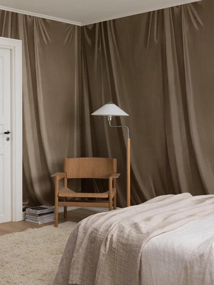 Drape is a hand-painted trompe-l'œil wallpaper mural with soft drapery that deceives the eye and gives the room a beautiful textile feel. 