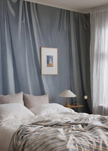 The painterly wallpaper mural Drape captures the feel of softly draping fabric, hand-painted with a canvas texture and artistic brushstrokes.