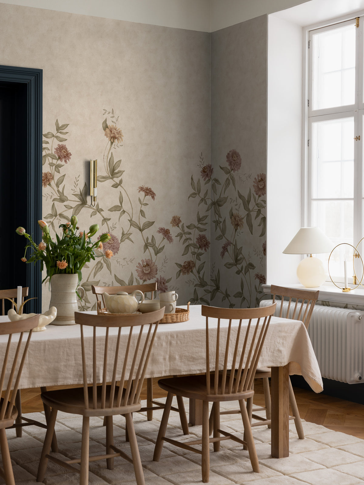 Zinnia Grand Climbing is a Romantic floral wallpaper where different varieties of zinnias softly climb up the wall.