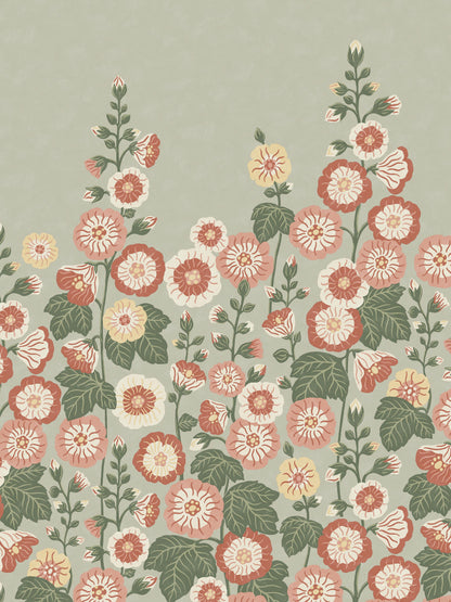 Happy Hollyhocks Grand is a vibrant floral wallpaper where lush hollyhocks grow all the way up to the ceiling.