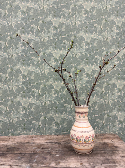 Bladverk is a rich and expressive wallpaper design inspired by the lush foliage and blossoms of the chestnut tree. 