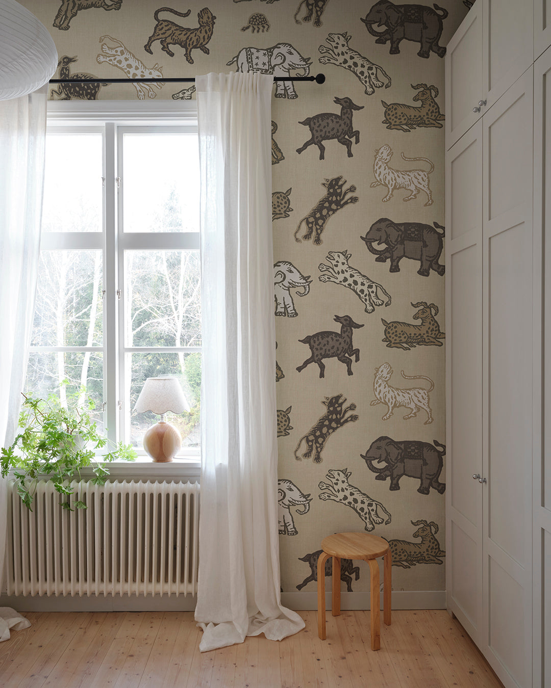 A true Sandberg classic wallpaper mural that has featured on both wallpaper but primarily on fabric for many years. Inspired by Indian tapestries.