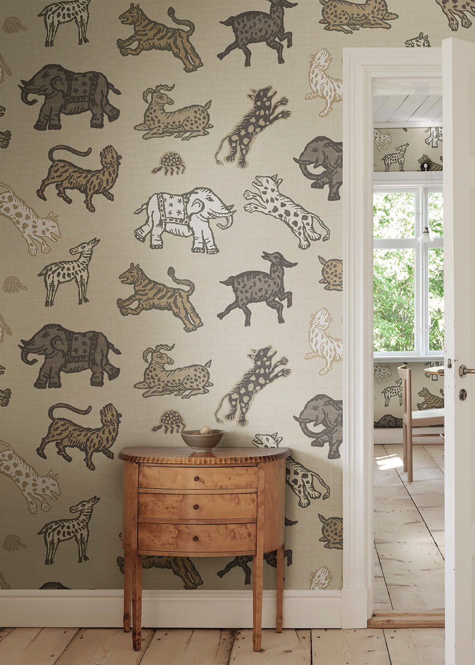 A true Sandberg classic wallpaper mural that has featured on both wallpaper but primarily on fabric for many years. Inspired by Indian tapestries.