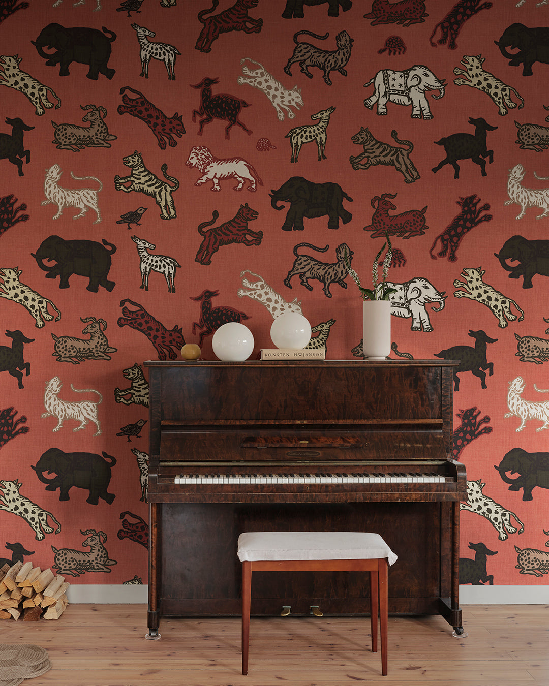 A true Sandberg classic. Inspired by Indian tapestries, these imaginative animals on a rich red background lend an international feel with a tone that is both playful and becoming.