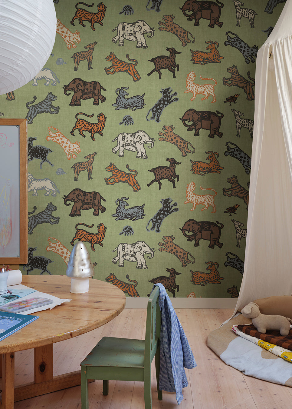 A true Sandberg classic. Inspired by Indian tapestries, these imaginative animals on a rich red background lend an international feel with a tone that is both playful and becoming.