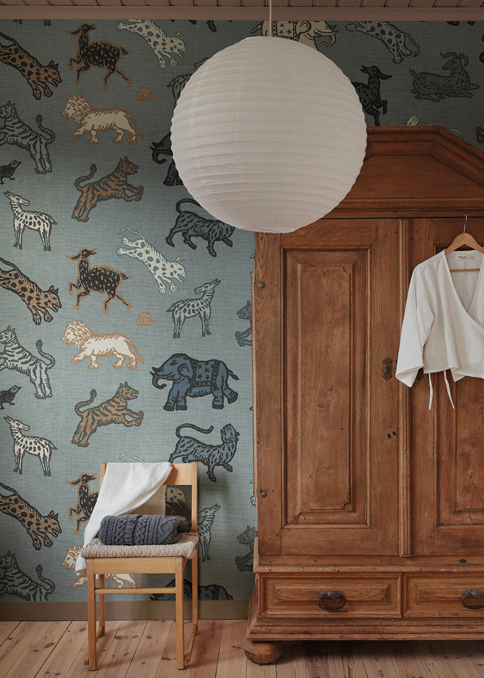 A true Sandberg classic. Inspired by Indian tapestries, these imaginative animals on a rich red background lend an international feel with a tone that is both playful and becoming.