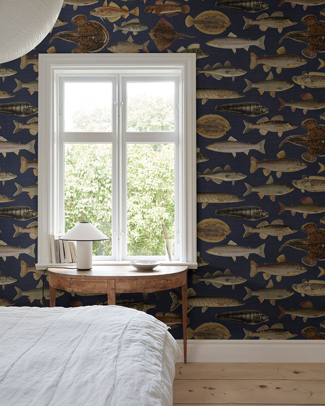 The illustrations for this fish wallpaper mural come from the work “Skandinaviska fiskar” (Scandinavian Fish) by Wilhelm von Wright, a Finnish illustrator active in the mid-19th century