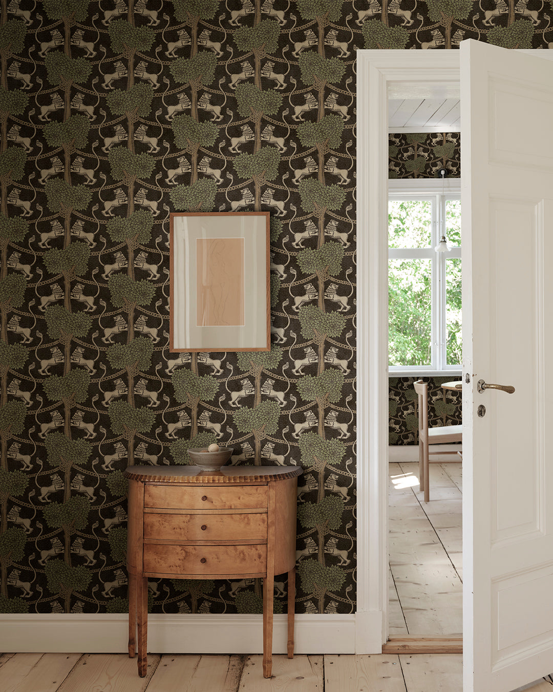 With playful elegance, the Leopold wallpaper mural makes the room both modern and international and is available in four becoming colorways.