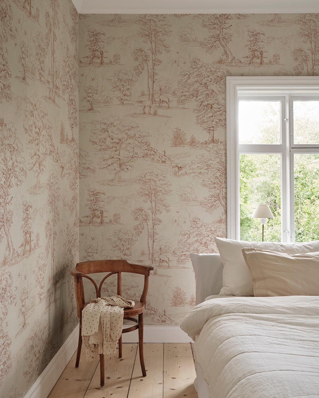 Follow the beautiful hiking trails on the edge of the Pyrenees mountains among flocks of sheep and wild deer. This toile wallpaper is Sandberg's own travelogue from Southern France with a hand-drawn illustration on a becoming textile background, in a warm terracotta hue.