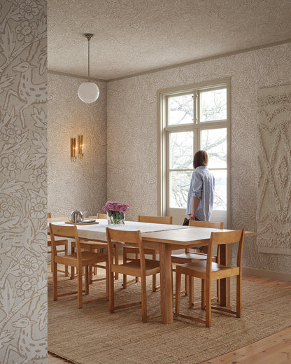 A wallpaper mural inspired by Indian textile art and Arts & Crafts, creating a fantastic pictorial narrative with history and patina. 