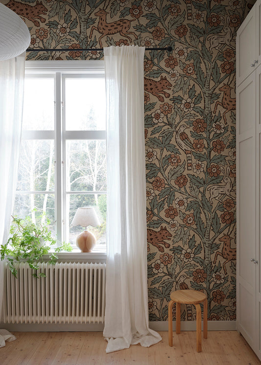 This wallpaper mural is inspired by Indian textile art and Arts & Crafts, creating a fantastic pictorial narrative with history and patina