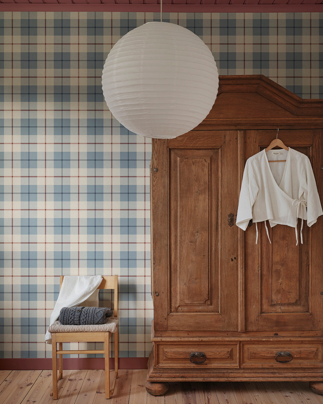 Ranold was in the assortment for a long time as a traditionally printed wallpaper, and now we have made a new interpretation on a larger scale mural and added a textile character.