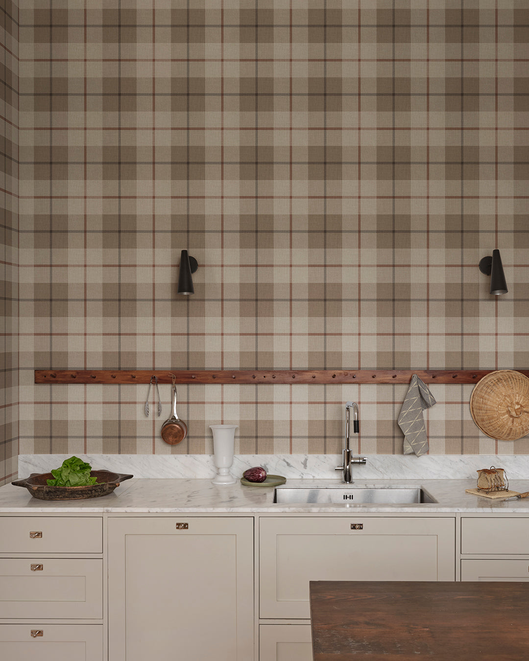 Ranold was in the assortment for a long time as a traditionally printed wallpaper, and now we have made a new interpretation on a larger scale mural and added a textile character.